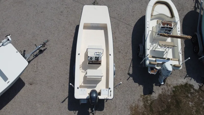 Slide: The Image of Aerial view of a 2000 Jones Brothers Bateau boat on a trailer. - 5