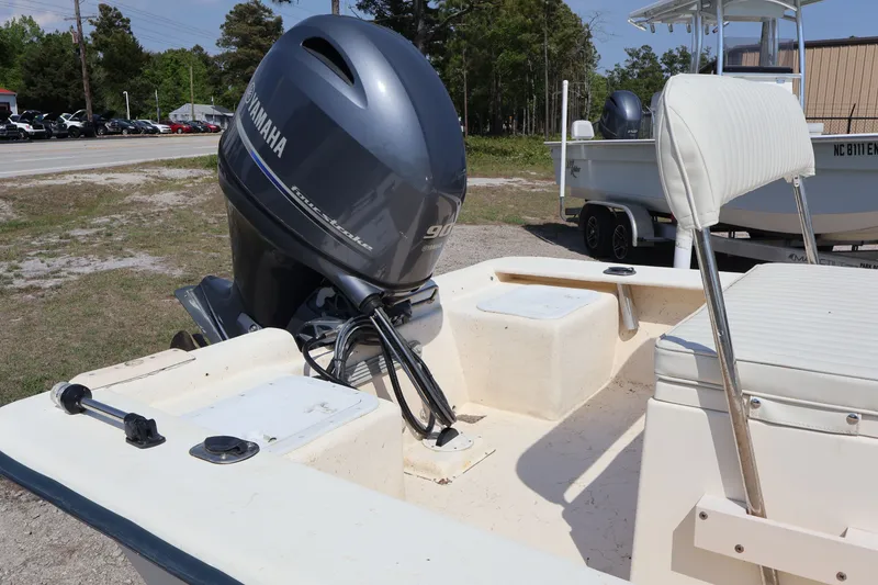 Slide: The Image of 2000 JONES BROTHER BATEAU with Yamaha motor on a parking lot. - 7