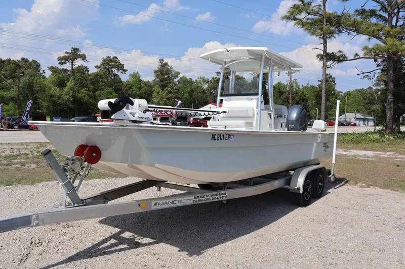 The Image of 2020 KenCraft F2460 BAY RIDER boat on trailer outdoors. - 1