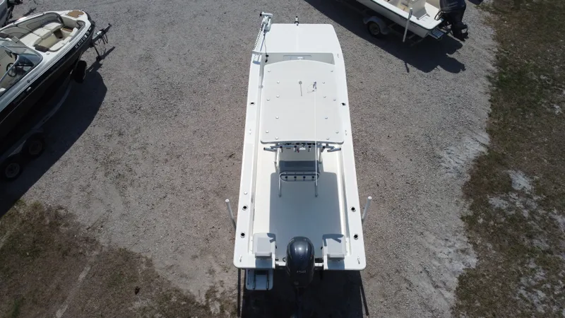 Slide: The Image of Aerial view of 2020 KenCraft F2460 BAY RIDER boat on gravel. - 4