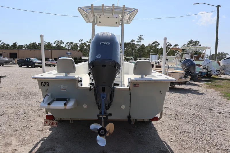 Slide: The Image of Rear view of a 2020 KenCraft F2460 BAY RIDER boat with outboard motor. - 5