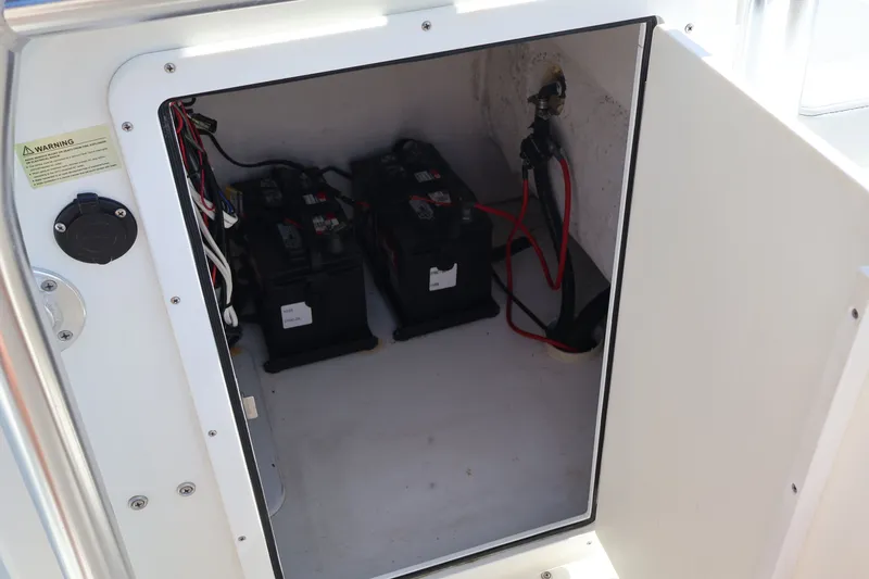 Slide: The Image of Battery compartment of 2020 KenCraft F2460 BAY RIDER with two batteries. - 8