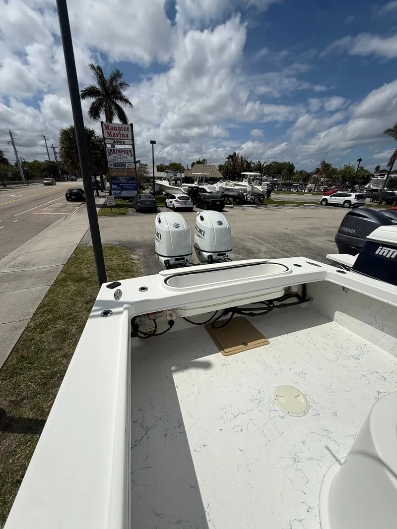 Slide: The Image of C-Hawk Center Console 29 boat, 2021, parked at Manatee Marina. - 13