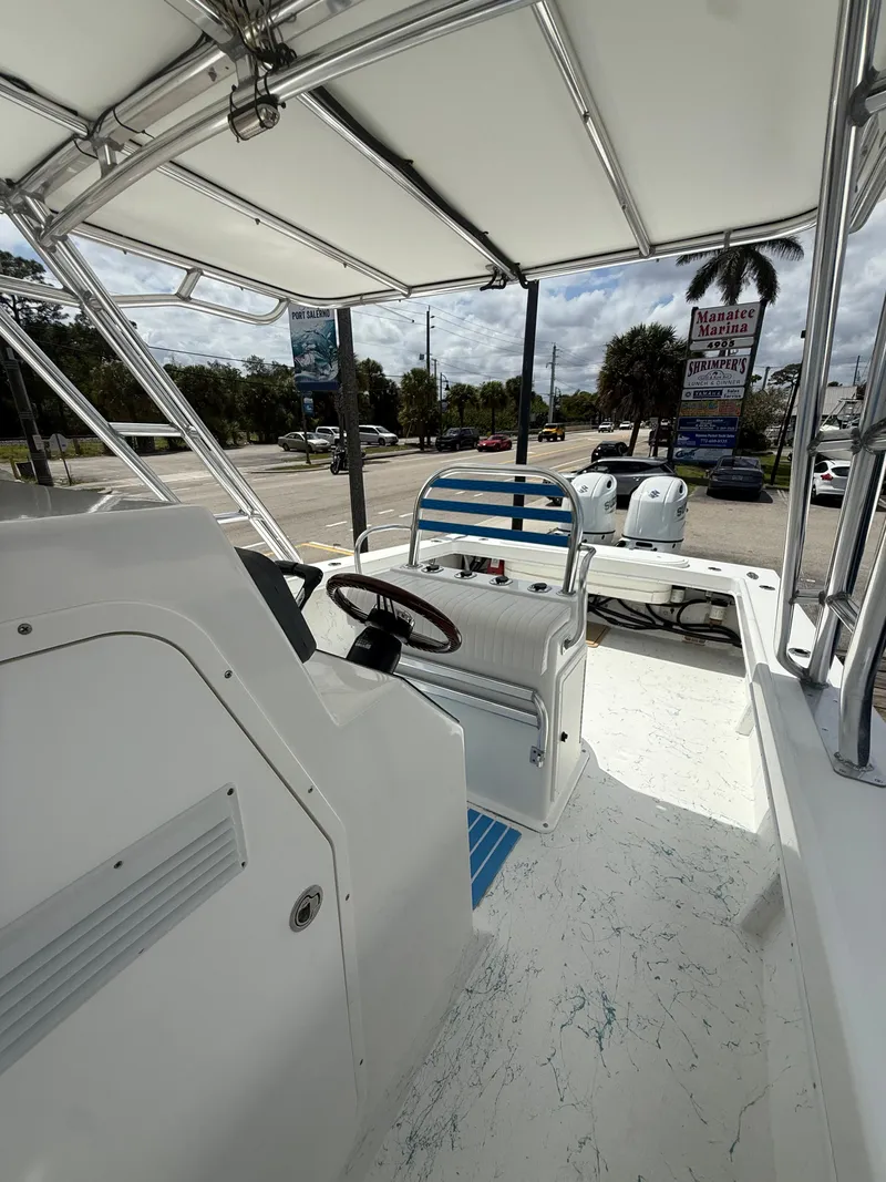 Slide: The Image of Interior view of a 2021 C-Hawk Center Console 29 boat. - 7