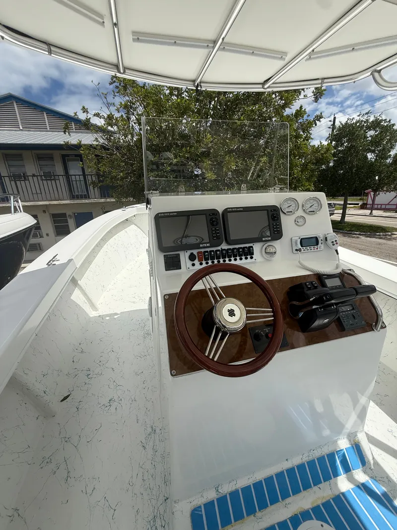 Slide: The Image of C-Hawk Center Console 29, 2021, helm with instruments. - 9