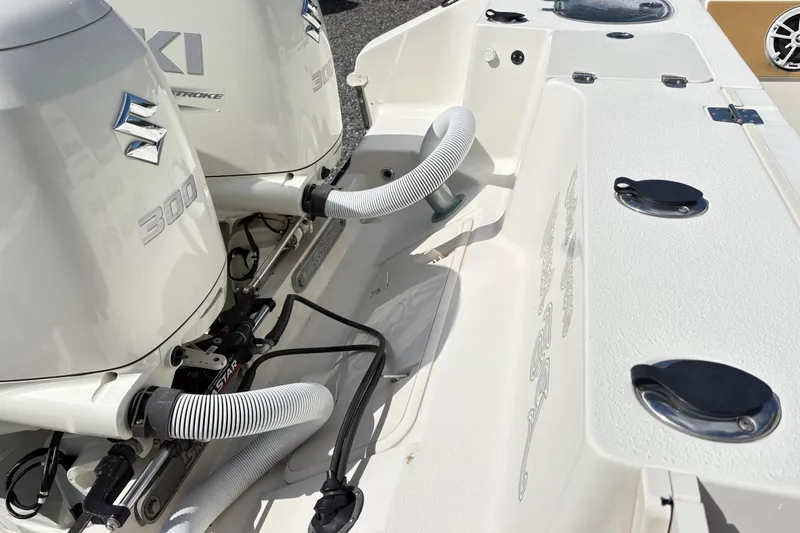 Slide: The Image of 2017 Carolina Skiff Sea Chaser 27 HFC with dual Suzuki 300 outboard engines. - 10