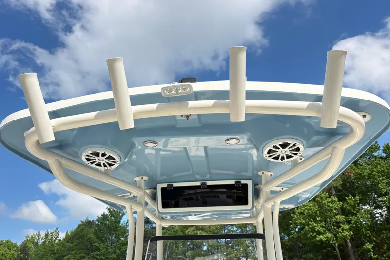 Slide: The Image of 2017 Carolina Skiff Sea Chaser 27 HFC boat top with rod holders and speakers. - 20