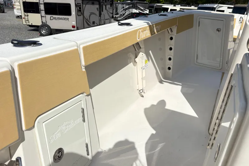 Slide: The Image of 2017 Carolina Skiff Sea Chaser 27 HFC boat interior with storage compartments. - 21