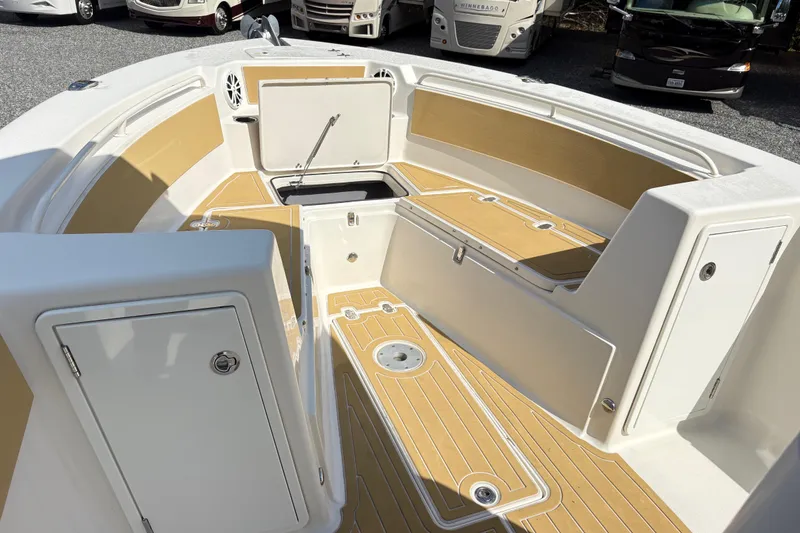 Slide: The Image of 2017 Carolina Skiff Sea Chaser 27 HFC boat interior with storage compartments. - 22