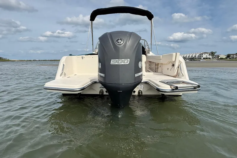 Slide: The Image of 2017 Grady-White Freedom 235 boat with Yamaha engine in shallow water. - 25