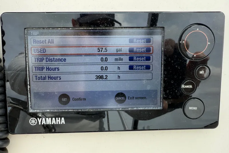 Slide: The Image of Yamaha display showing fuel usage and trip data for 2017 Grady-White Freedom 235 boat. - 36