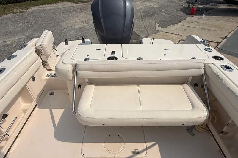 Slide: The Image of 2017 Grady-White Freedom 235 boat interior with seating and storage compartments. - 48