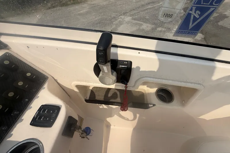 Slide: The Image of Control panel of a 2017 Grady-White Freedom 235 boat with Yamaha throttle. - 59