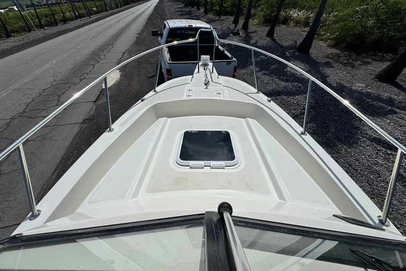 Slide: The Image of 1991 Boston Whaler 21 Conquest R boat on trailer, viewed from above. - 12