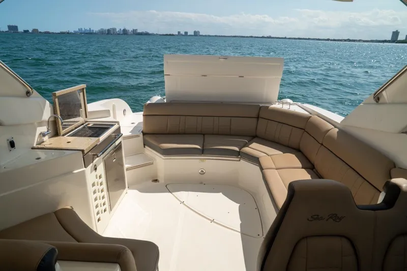Slide: The Image of Luxurious 2016 Sea Ray SLX 350 boat interior with spacious seating and ocean view. - 12