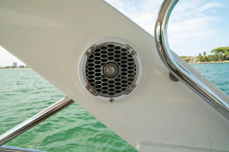Slide: The Image of Speaker on 2016 Sea Ray SLX 350 boat, with ocean and shoreline in background. - 16