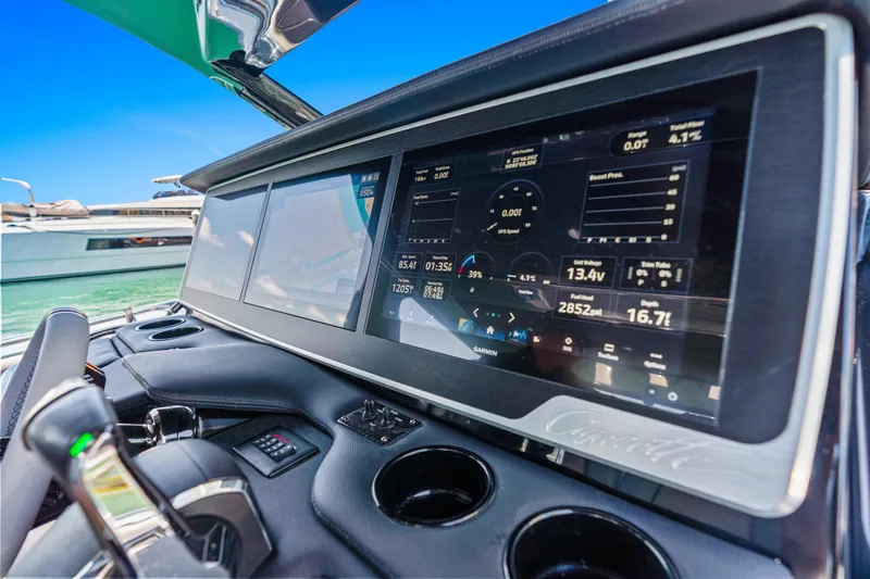 Slide: The Image of Dashboard of 2024 Cigarette 42' Auroris boat with advanced navigation display. - 14