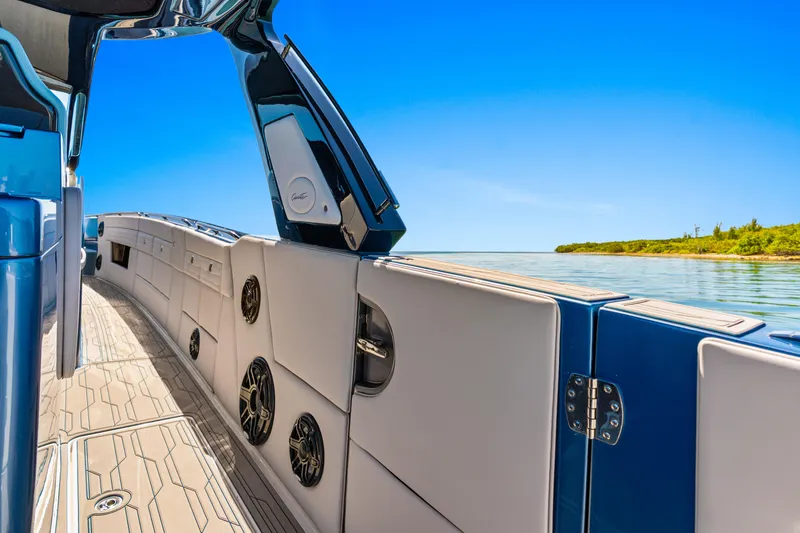 Slide: The Image of 2024 Cigarette 42' Auroris luxury boat interior with sleek design and ocean view. - 17