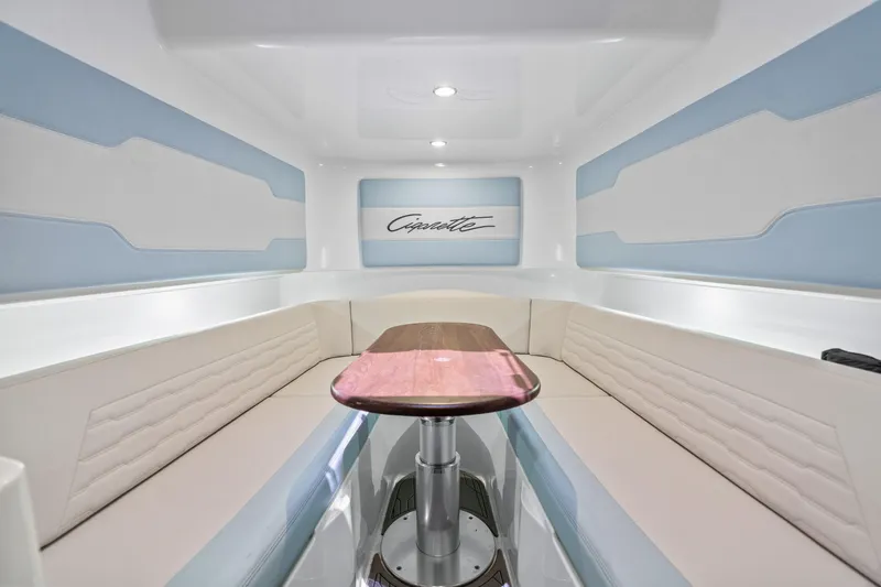 Slide: The Image of Luxurious interior of 2024 Cigarette 42' Auroris boat with elegant seating and table. - 24
