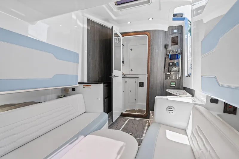 Slide: The Image of Luxurious interior of 2024 Cigarette 42' Auroris boat with modern seating and control panel. - 26