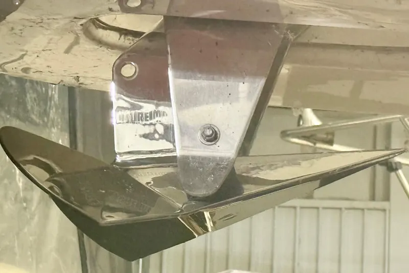 Slide: The Image of Close-up of a 1996 Sea Ray boat's polished metal anchor detail. - 19