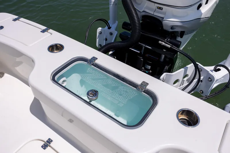 Slide: The Image of Livewell on 2022 ZCB Freemason 26 boat, featuring sleek design and modern fittings. - 13