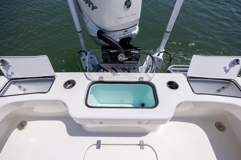 Slide: The Image of Rear view of 2022 ZCB Freemason 26 boat with Mercury engine on water. - 16