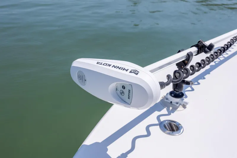 Slide: The Image of Minn Kota Riptide motor on ZCB Freemason 26 boat, 2022 model, in calm water. - 34