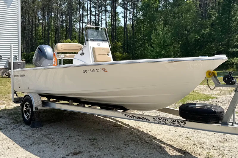 Slide: The Image of 2017 Sportsman Masters 207 Bay Boat on trailer, parked outdoors. - 3