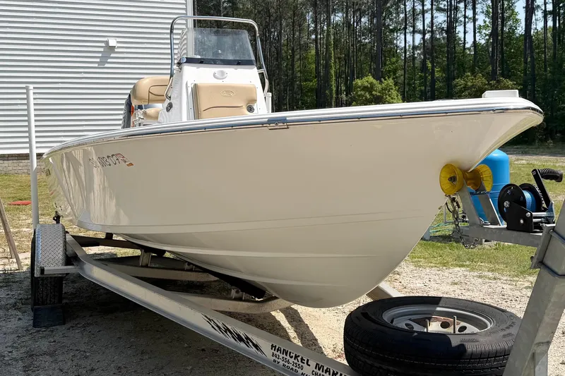 Slide: The Image of 2017 Sportsman Masters 207 Bay Boat on trailer, parked outdoors. - 4