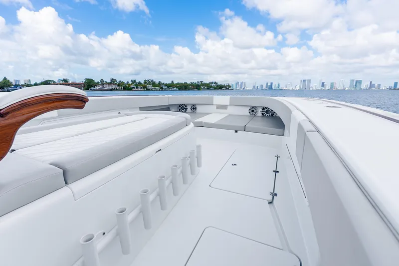 Slide: The Image of Luxurious 2024 Freeman 47 yacht interior with sleek seating and ocean view. - 38