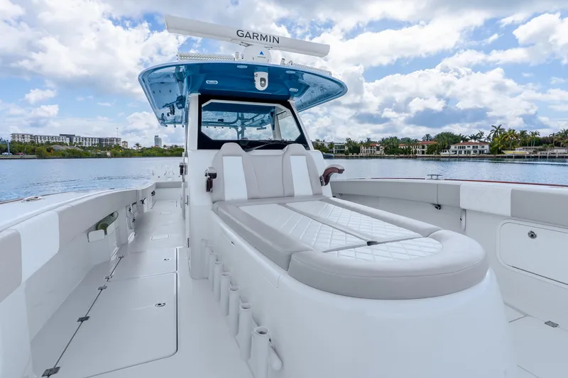 Slide: The Image of Luxurious 2024 Freeman 47 boat interior with plush seating and advanced Garmin navigation system. - 39