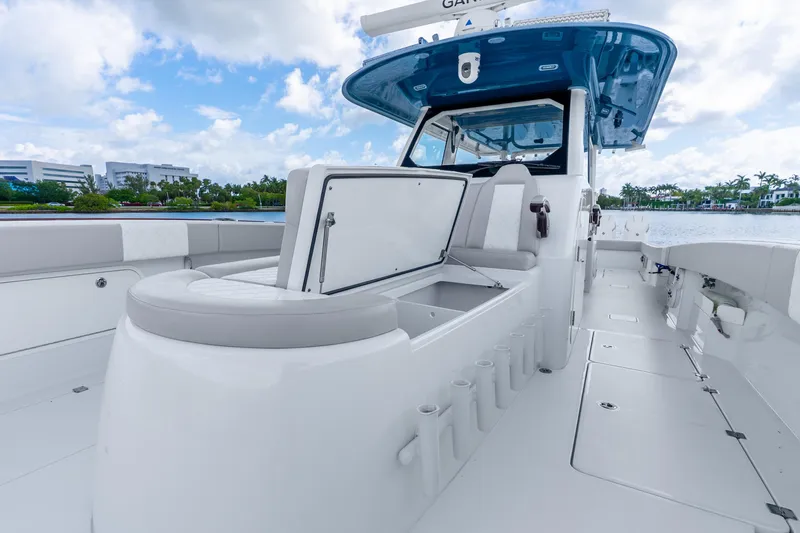 Slide: The Image of 2024 Freeman 47 boat interior with open storage, sleek design, and waterfront view. - 40