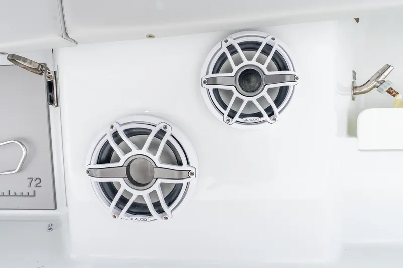 Slide: The Image of White JL Audio speakers on Freeman 47 boat, 2024 model. - 62