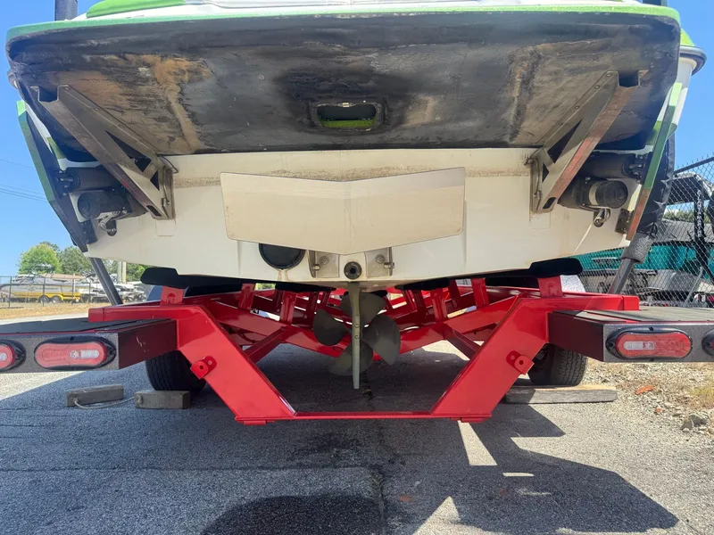 Slide: The Image of Rear view of a 2016 Axis T22 boat on a red trailer. - 4