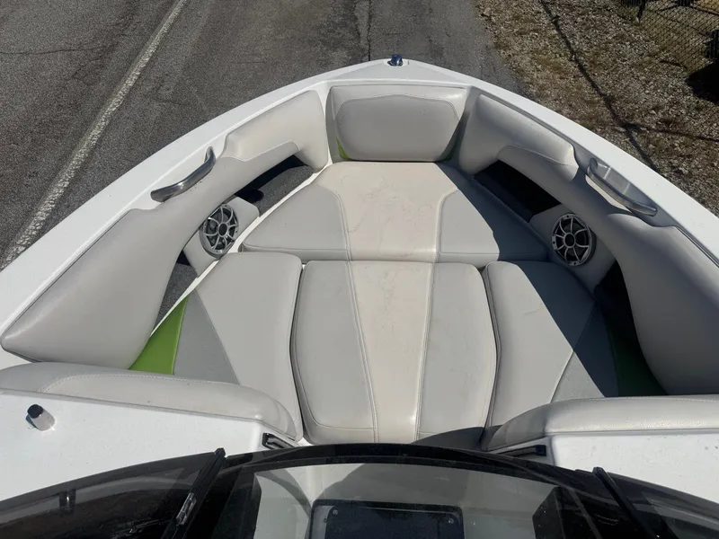 Slide: The Image of Interior of a 2016 Axis T22 boat with gray upholstery. - 9