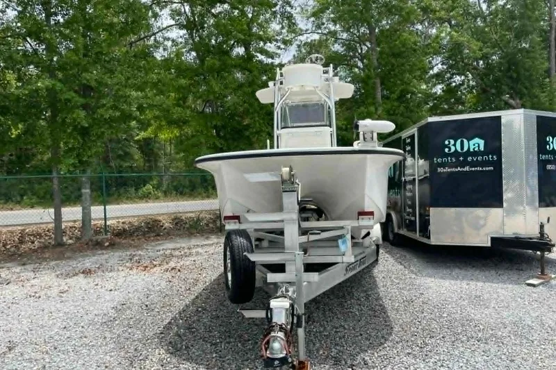 Slide: The Image of 2019 Tideline 235 Hybrid - Front Bow and Trailer Ladder View - 5
