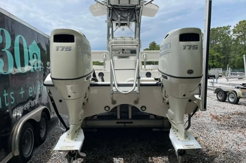 Slide: The Image of 2019 Tideline 235 Hybrid - Twin Suzuki 175 Outboards and Stern View - 9