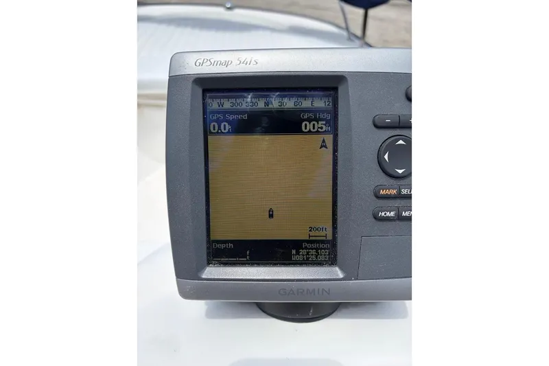 Slide: The Image of Garmin GPSmap 541s on 2002 Boston Whaler 130 Sport, displaying navigation data. - 19