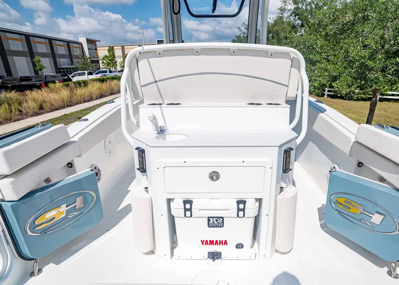 Slide: The Image of Sea Hunt Ultra 265 SE 2026 with Yamaha cooler on deck. - 13