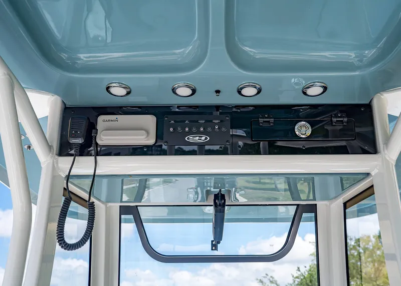 Slide: The Image of Interior view of Sea Hunt Ultra 265 SE 2026 with electronics. - 16