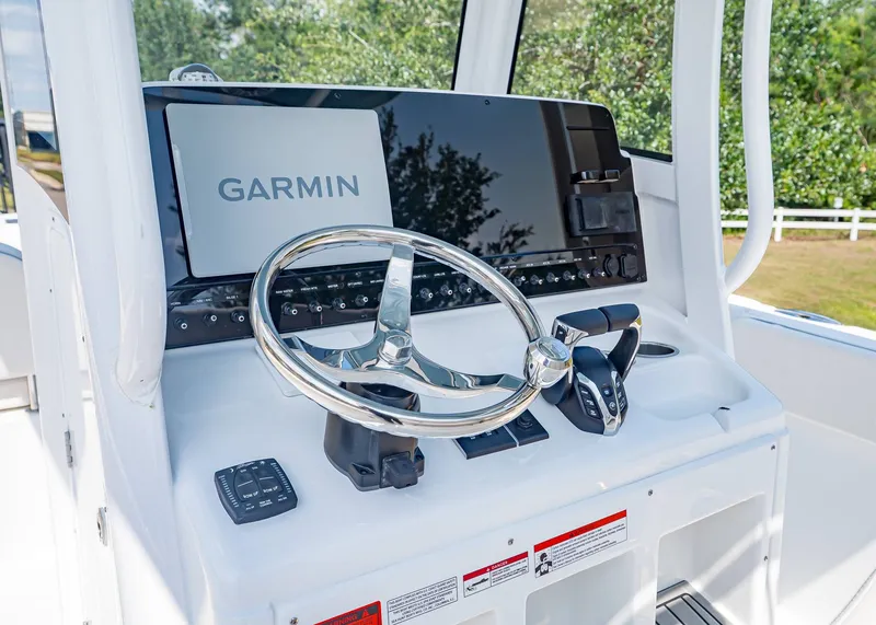 Slide: The Image of Sea Hunt Ultra 265 SE 2026 helm with Garmin navigation system. - 18