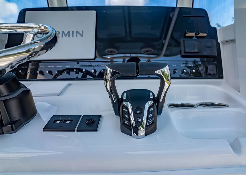 Slide: The Image of Control console of Sea Hunt Ultra 265 SE boat, year 2026. - 19