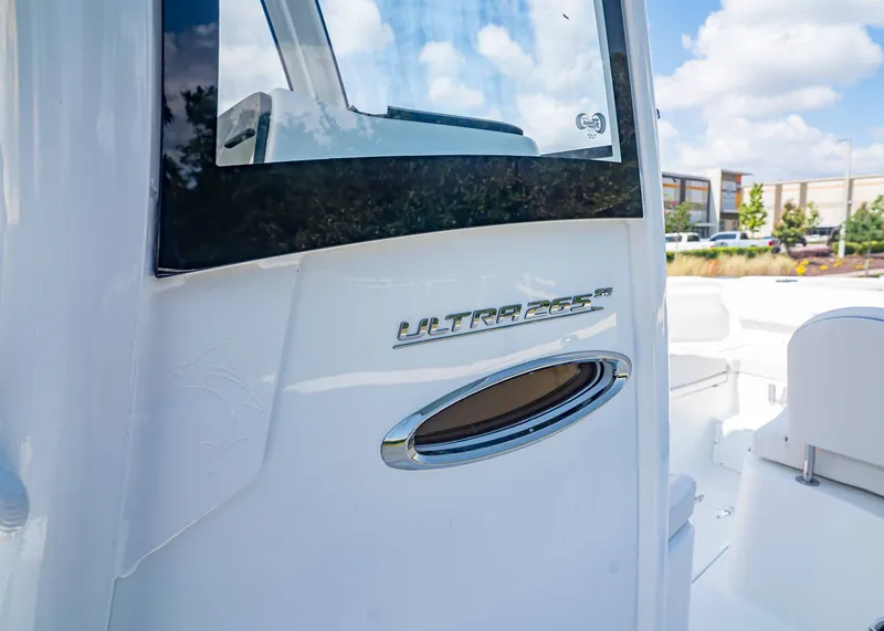 Slide: The Image of Sea Hunt Ultra 265 SE 2026 boat with sleek logo. - 20