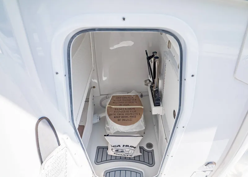 Slide: The Image of Interior of Sea Hunt Ultra 265 SE 2026 with storage space. - 24