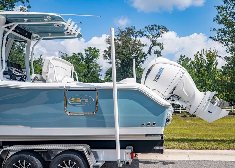 Slide: The Image of Sea Hunt Ultra 265 SE 2026 on trailer with Yamaha engine. - 3
