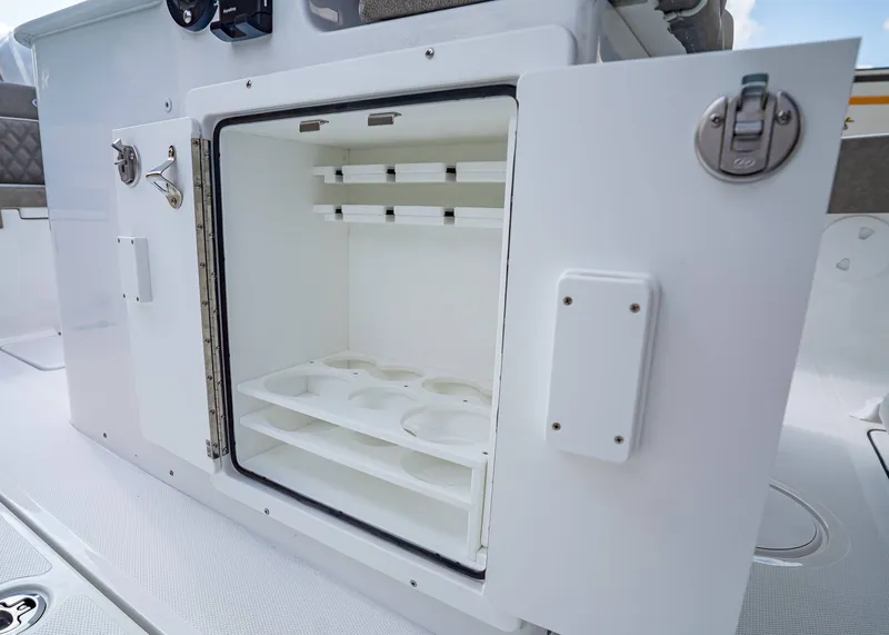 Slide: The Image of Open storage compartment on Sea Hunt ULTRA 285CB boat, 2026 model. - 17