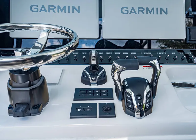 Slide: The Image of Sea Hunt ULTRA 285CB 2026 helm with Garmin technology. - 24