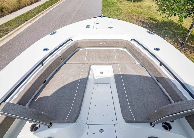 Slide: The Image of 2026 Sea Hunt ULTRA 285CB with spacious bow seating and cushions. - 28