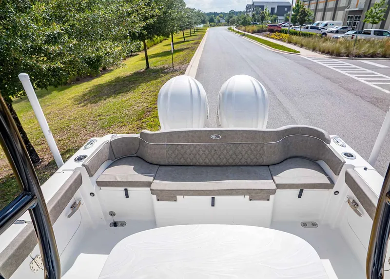 Slide: The Image of Rear view of Sea Hunt ULTRA 285CB boat, 2026 model. - 7